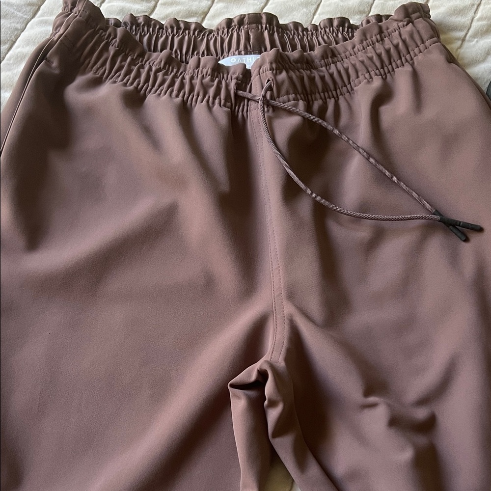 Two Athleta Women's trouser/joggers in Mauve and green. Great condition. Size 6.